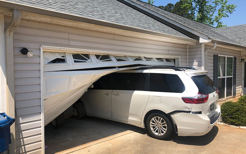 Emergency garage door repair for damaged door